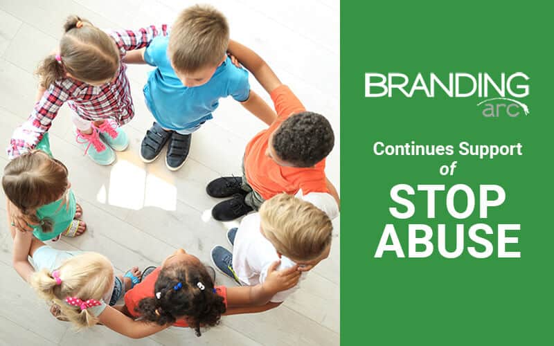 A brandingArc of children in a circle continues to support the stop abuse cause.